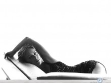 Alyssa Milano lying black and white wallpaper