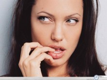 Angelina Jolie bitting wallpaper