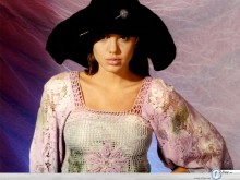 Angelina Jolie with hat and dress wallpaper