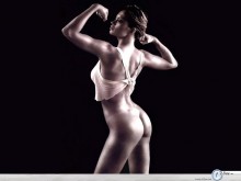 Anna Falchi showing of her muscles wallpaper