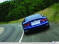Aston Martin wallpapers: Aston Martin Db7 blue back view wallpaper