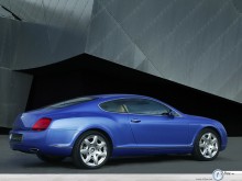 Bentley Coupe near the building wallpaper