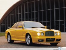 Bentley yellow left front view wallpaper