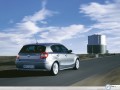 Bmw Serie 1 wallpapers: Bmw Serie 1 rear view on the road wallpaper