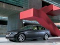 Bmw Serie 3 under red stairs wallpaper