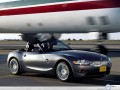 BMW wallpapers: Bmw Z4 race with airplane wallpaper