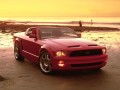 Ford Mustang wallpapers: Ford Mustang convertable in the beach wallpaper