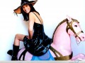 Julia Roberts wallpapers: Julia Roberts riding a horse toy wallpaper