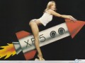 Kylie Minogue riding the rocket wallpaper