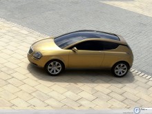 Lancia Concept Car golden on the road wallpaper