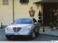 Lancia Thesis wallpapers: Lancia Thesis in city square wallpaper