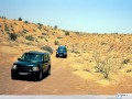 Land Rover Discovery on desert road  wallpaper