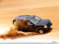 Land Rover Discovery on sand wallpaper