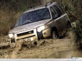 Land Rover Freelander in the mud wallpaper