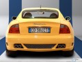 Maserati Coupe yellow back profile  wallpaper