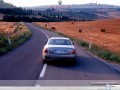 Maserati wallpapers: Maserati Quattroporte down the road wallpaper