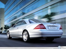 Mercedes Class Cl Coupe by the glass building wallpaper