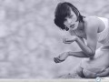 Milla Jovovich wallpapers: Milla Jovovich drinking water wallpaper