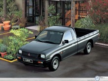 Mitsubishi L200 black in home garden wallpaper