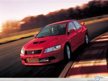 Mitsubishi Lancer Evolution red down the road wallpaper
