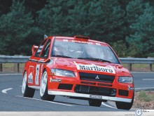 Mitsubishi Rally Wrc down the road wallpaper
