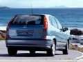 Nissan wallpapers: Nissan Almera Tino going to dock wallpaper