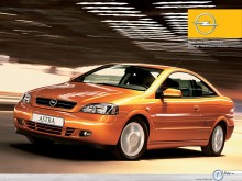 Opel Astra Coupe in garage  wallpaper