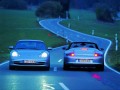 Porsche wallpapers: Porsche 911 Carrera 4 silver convertable wallpaper