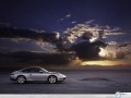 Porsche wallpapers: Porsche 911 Carrera 4s dark clouds wallpaper