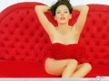 Rose Mc Gowan in red wallpaper