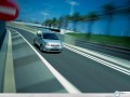 Toyota wallpapers: Toyota Yaris down the road wallpaper