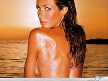 Vanessa Kelly nude in the beach wallpaper