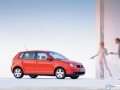 Volkswagen Polo wallpapers: Volkswagen Polo red and couple wallpaper